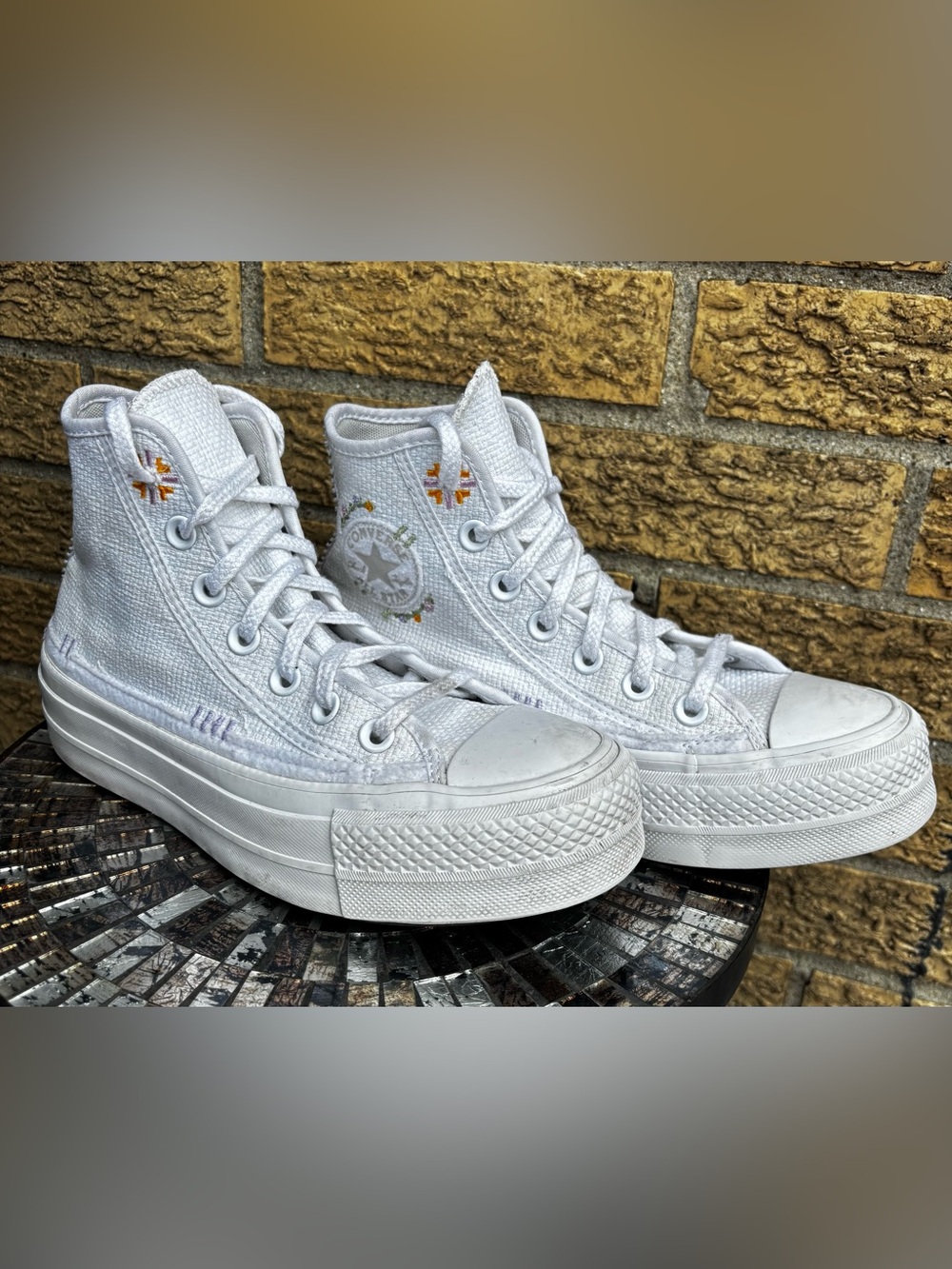 Converse White High-Top Platform Sneakers with Subtle Embroidered Accents